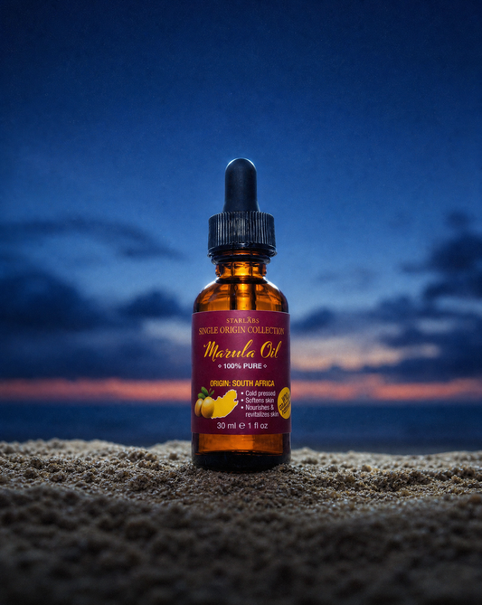 Star Labs Pure Marula Oil product for hair and skin featured in the sand overlooking the beach