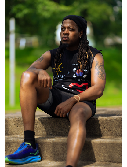 Black sports tank top with colorful graphic print and sleeveless design