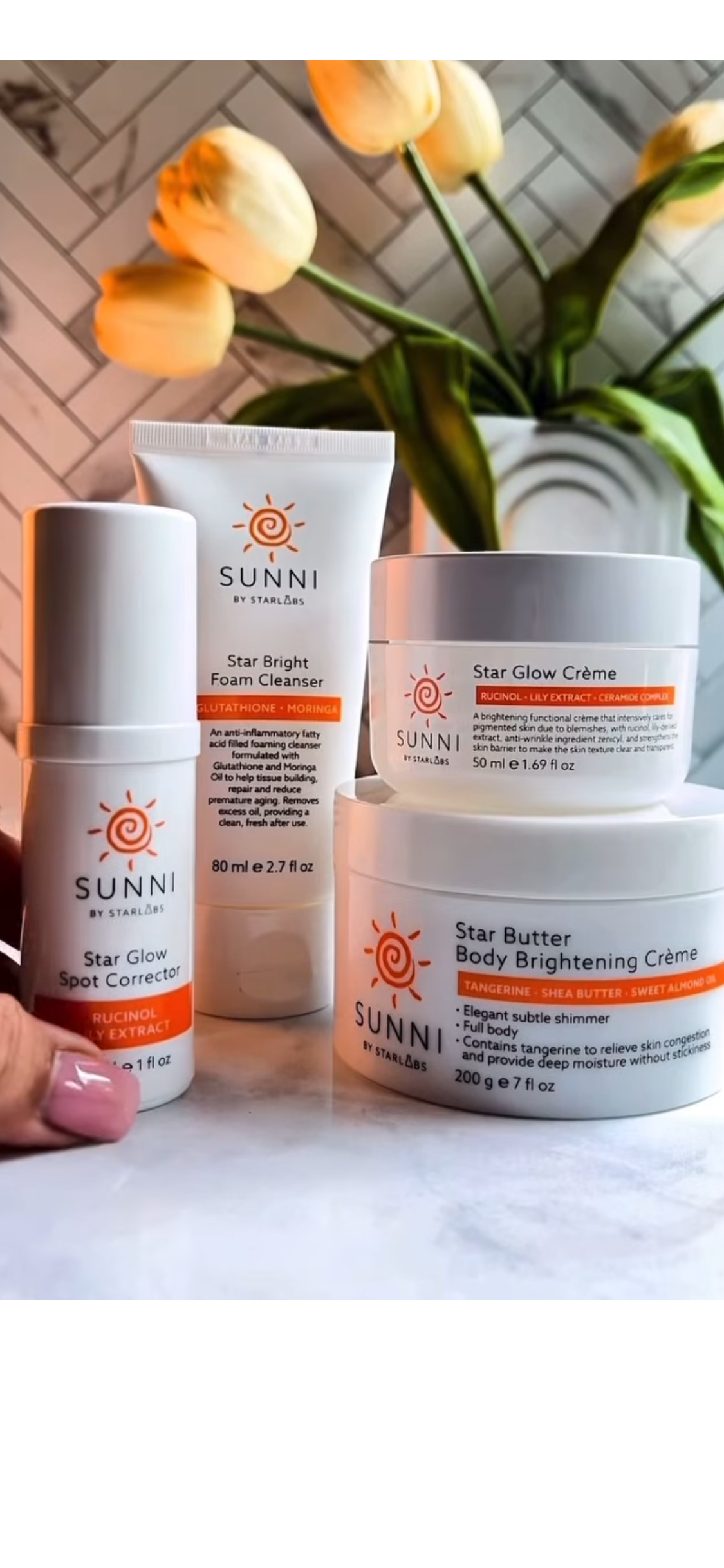 Load video: Woman using the full Brightening Collection